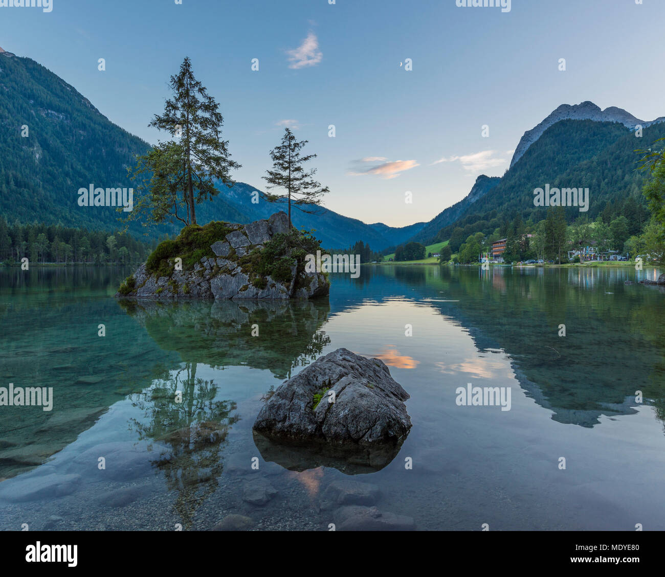 Lake Hintersee with rock island and mountains at dawn at Ramsau in the Berchtesgaden National Park in Upper Bavaria, Germany Stock Photo