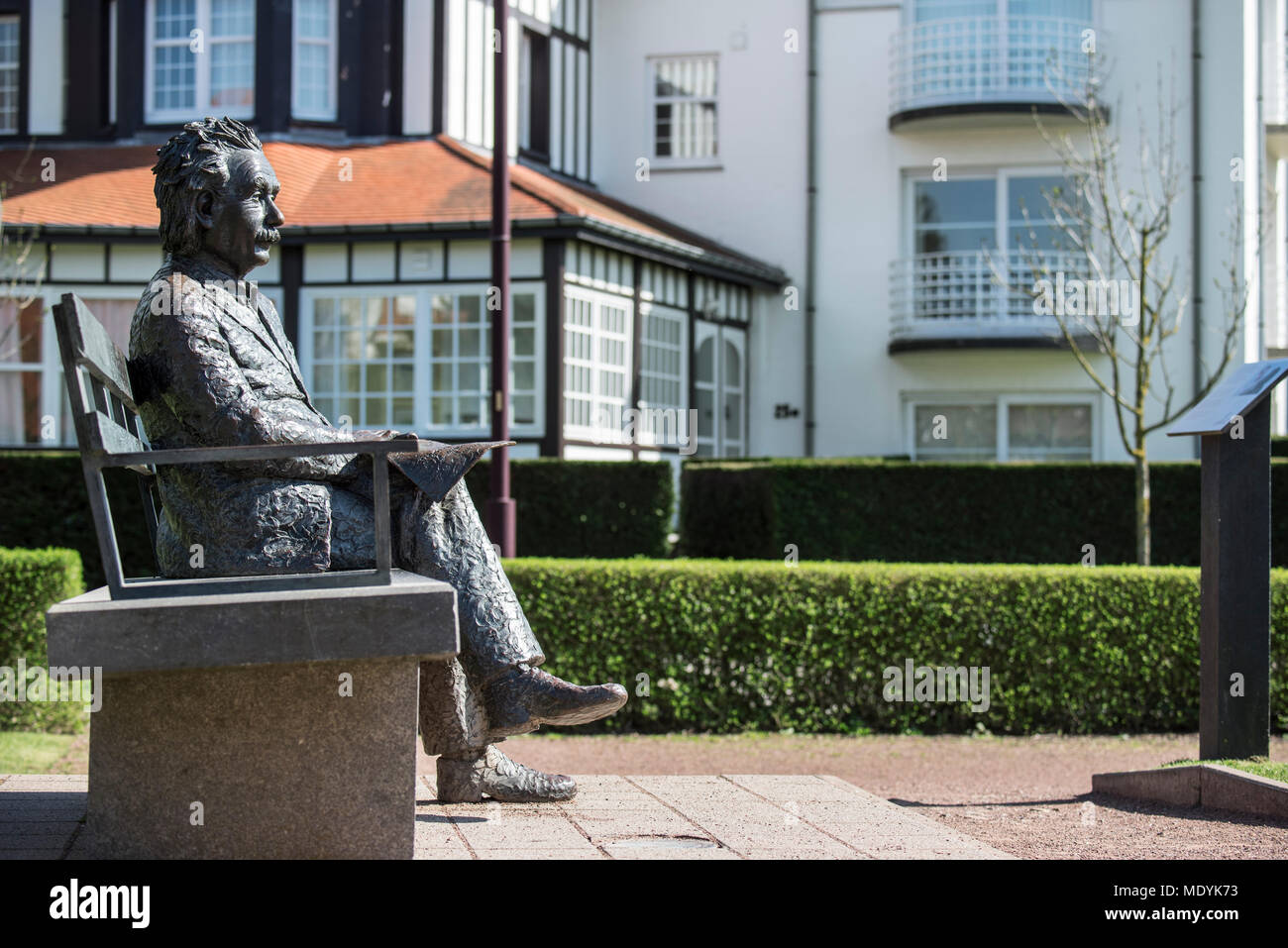 Albert Einstein statue sitting on a park bench at the seaside resort De Haan / Le Coq, West Flanders, Belgium Stock Photo