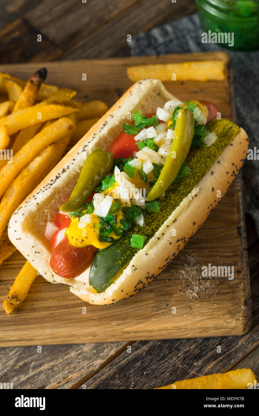 https://c8.alamy.com/comp/MDYKTB/homemade-chicago-style-hot-dog-with-mustard-pickles-relish-tomato-and-peppers-MDYKTB.jpg