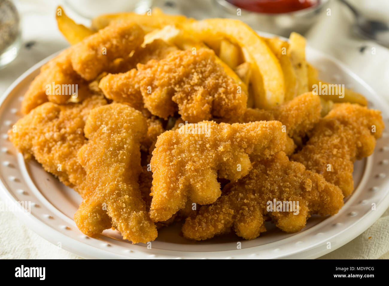 Dinosaur Chicken Nuggets And Smiley Fries