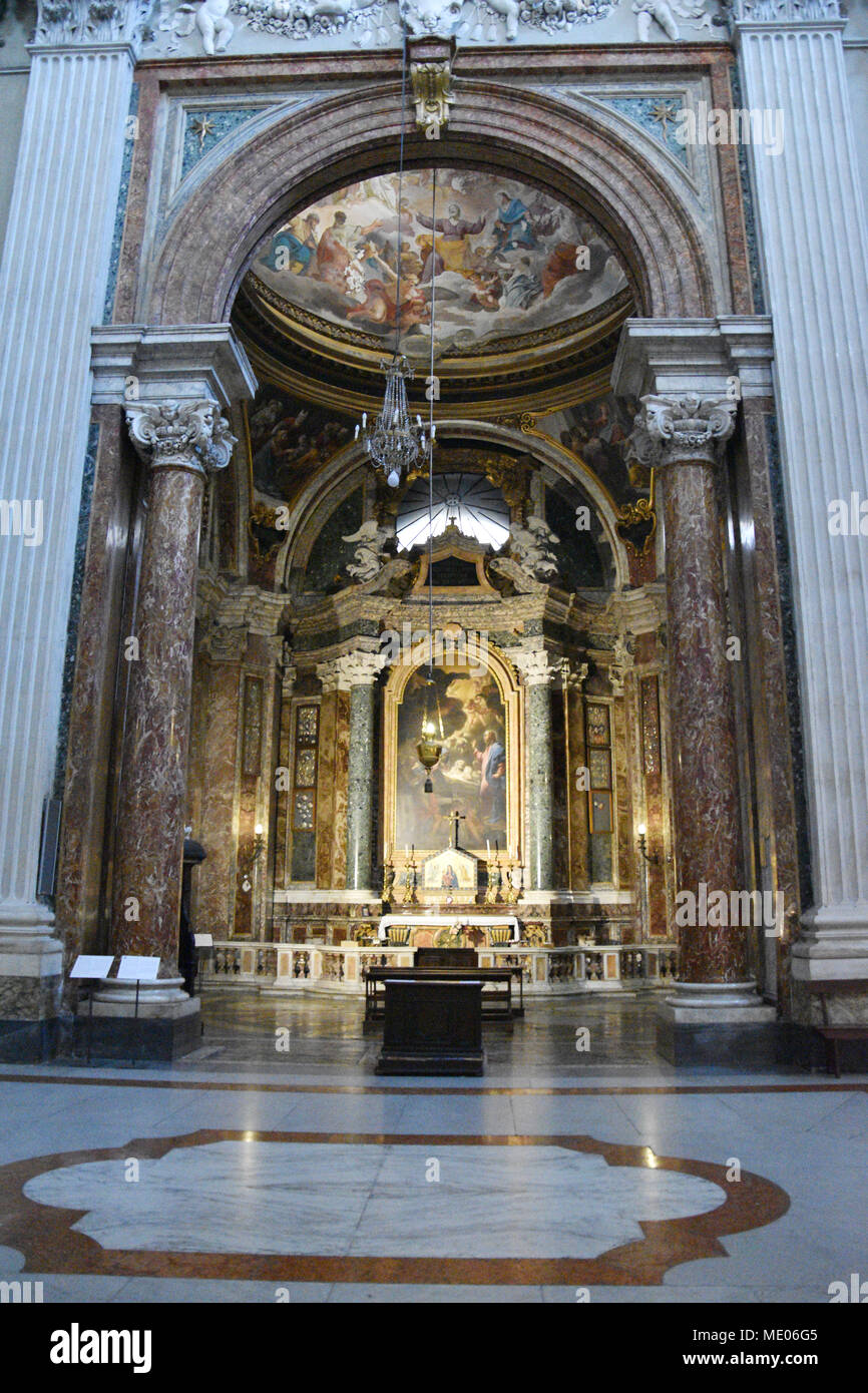 Side chapel through a marble archway. The Church of St. Ignatius of ...