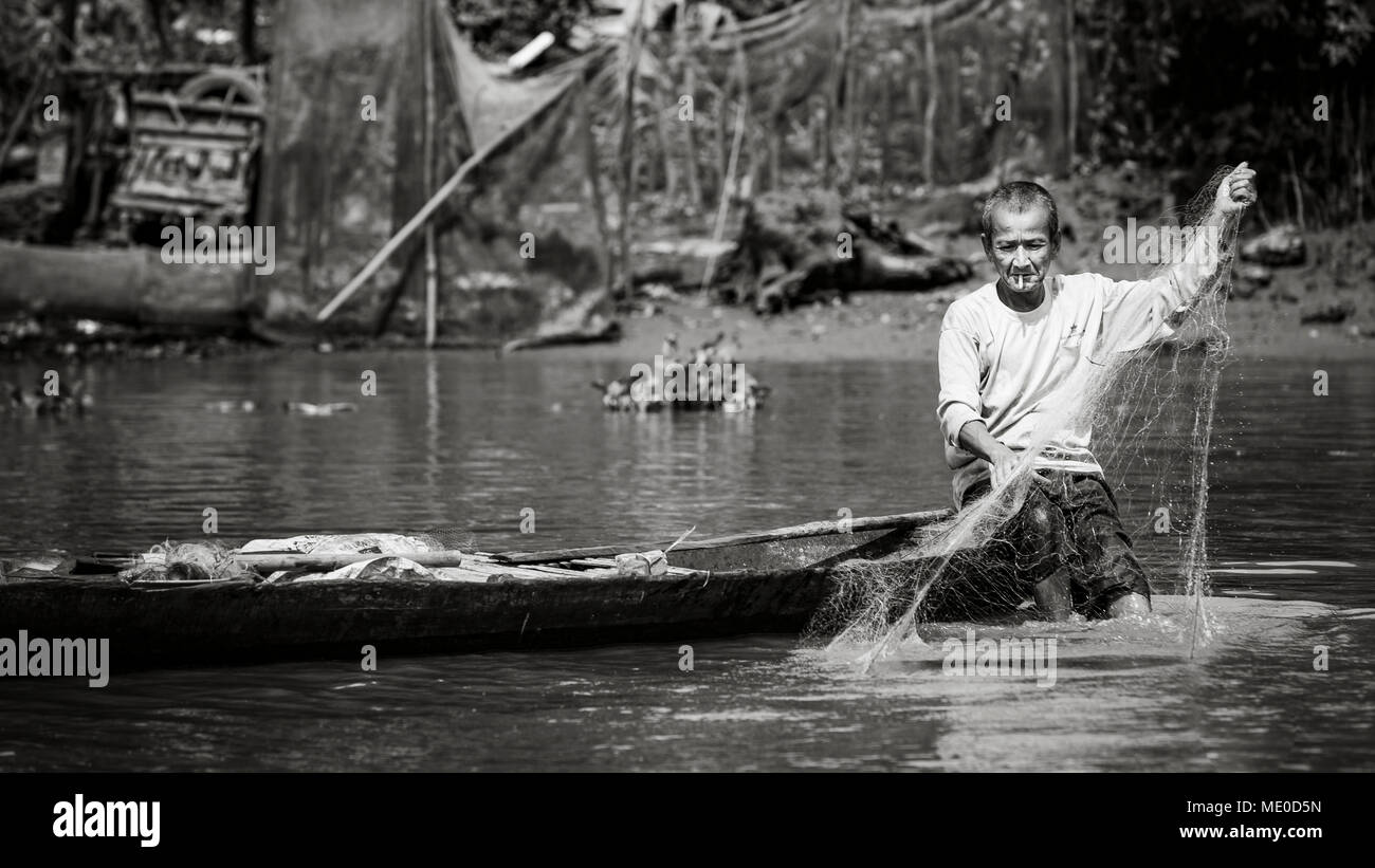Black and white smoking cigarette sitting hires stock photography and