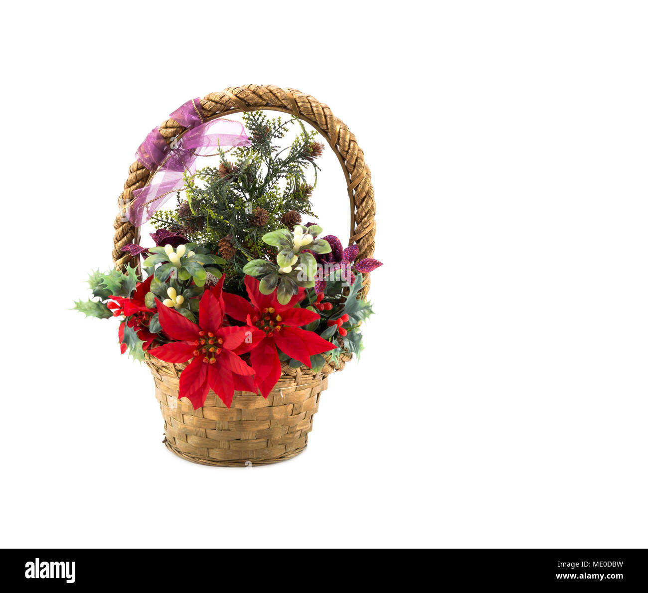 Christmas themed decorated wicker basket isolated on white Stock Photo