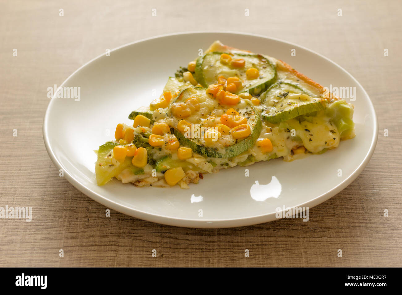 Delicious Slice Of Pizza Topping Zucchini Corn Kernels And Mozzarella Cheese White Dish On Rustic Wooden Table Detail Of Meal Closeup Selective Stock Photo Alamy