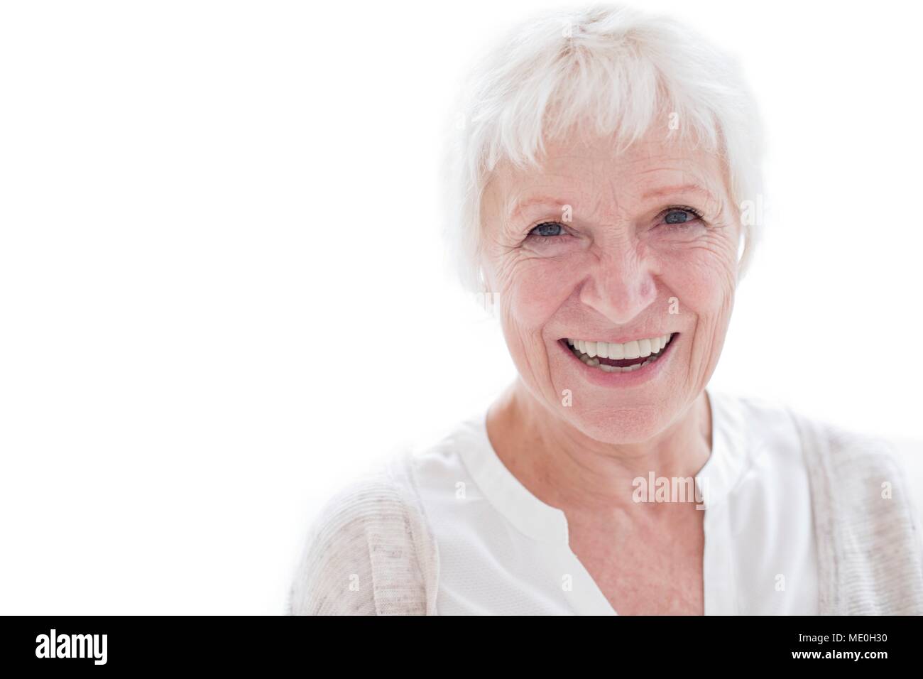 Senior woman smiling towards camera, portrait. Stock Photo