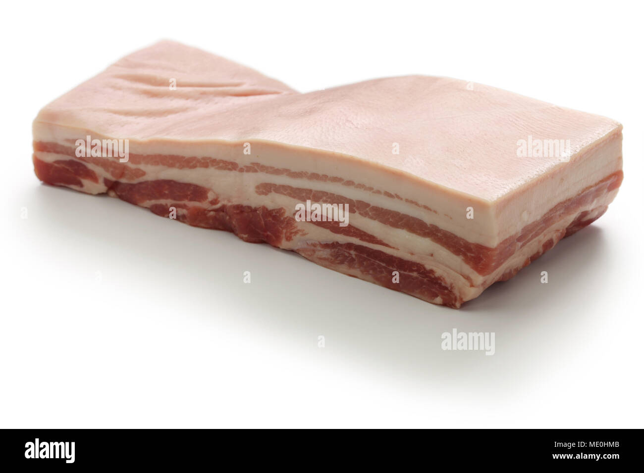 raw pork belly with rind isolated on white background Stock Photo Alamy