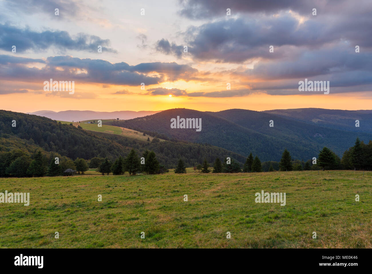 Mountain landscape with sunset over the Vosges Mountains at Le Markstein in Haut-Rhin, France Stock Photo