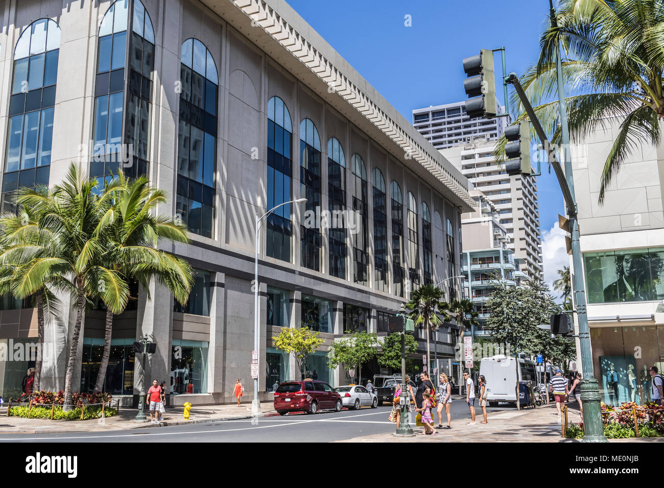 View North into Seaside Avenue from South side of Kalakaua Avenue with Waikiki Busines Plaza street level on the right in Waikiki Stock Photo