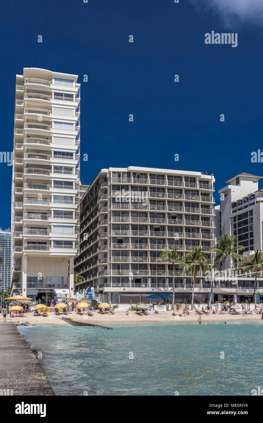 Castle Waikiki Shore (left), Outrigger Reef Waikiki Beach Resort (center), and Halekulani Hotel (far right) on Waikiki Beach, Waikiki Stock Photo