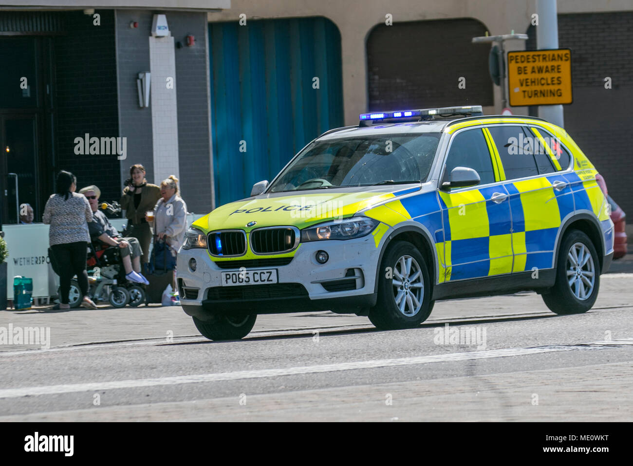 Blackpool police respond to emergency call, on the seafront promenade, UK Stock Photo