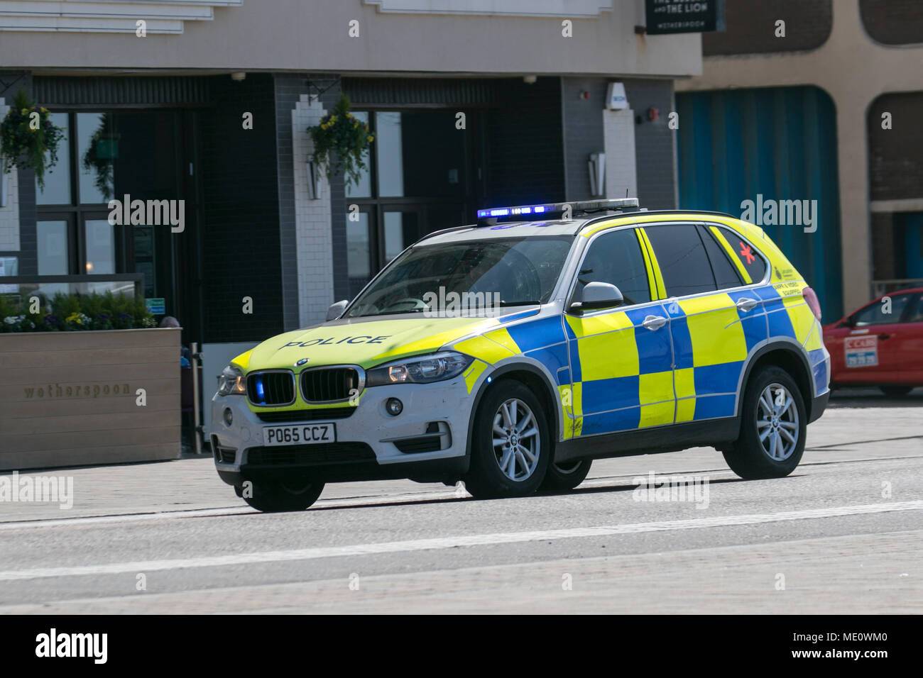 Blackpool police respond to emergency call, on the seafront promenade, UK Stock Photo