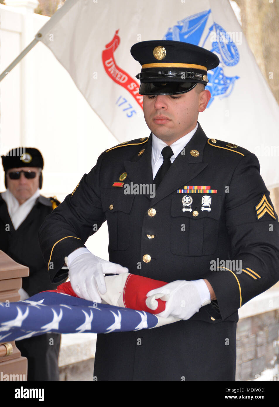 New York Army National Guard Sgt Ramon Rodriguez Folds A U S Flag 