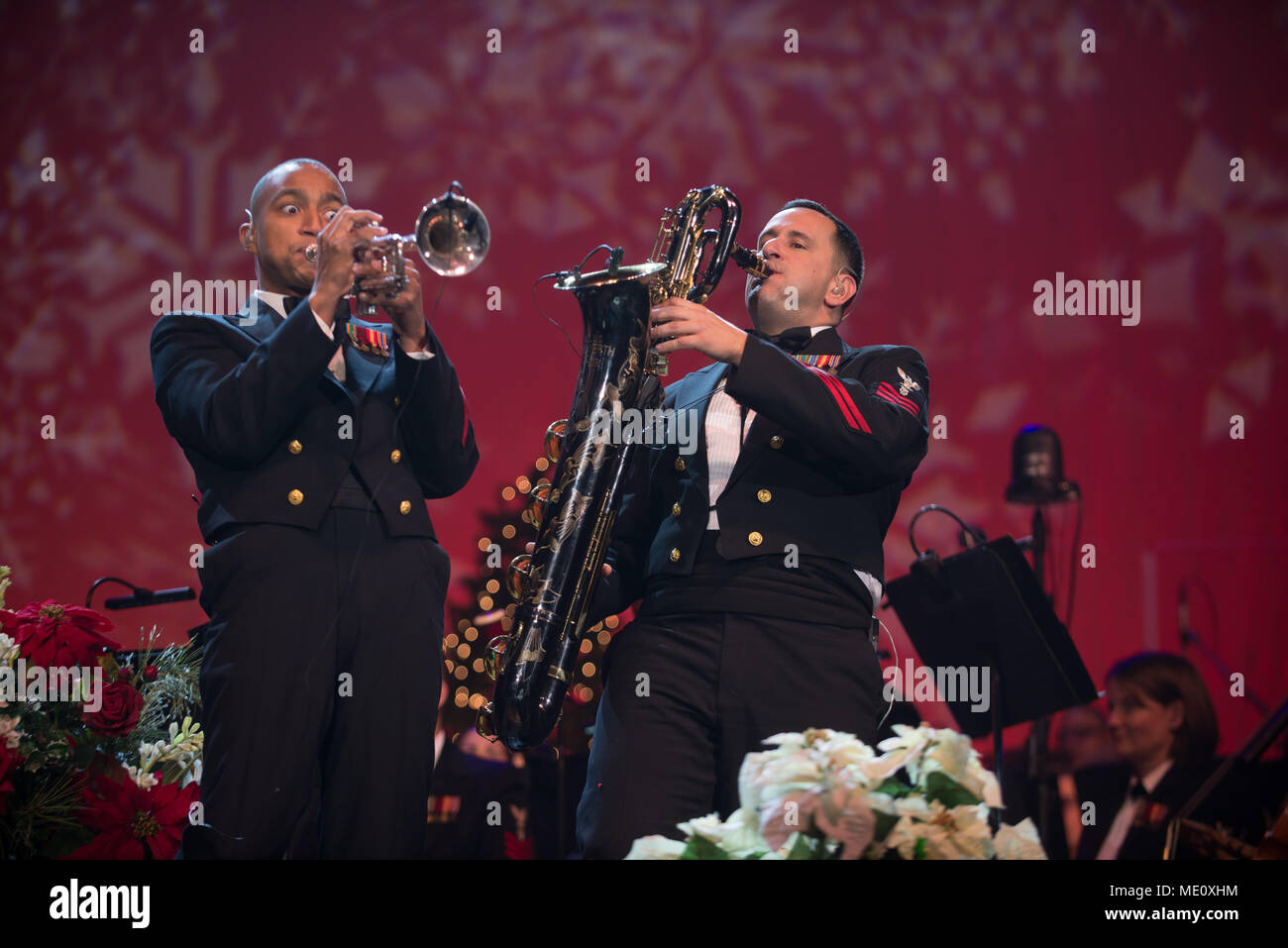 171216-N-VV903-1103 WASHINGTON (Dec. 16, 2017) Musicians 1st Class David A. Smith and  Manuel Pelayo de Gongora perform with the U.S. Navy Band during a holiday concert at DAR Constitution Hall in Washington. The Navy Band hosted thousands of people from the Washington area as well as hundreds of senior Navy and government officials during its three annual holiday concerts. (U.S. Navy photo by Musician 1st Class David Aspinwall/Released) Stock Photo