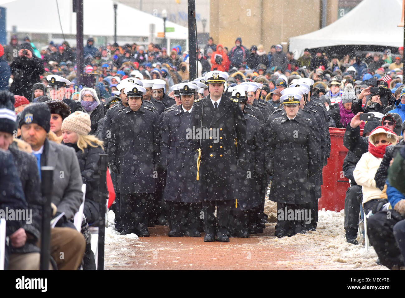 171216-N-N0101-106 BUFFALO, N.Y. (Dec. 16, 2017) The Blue crew of the freedom variant littoral combat ship USS Little Rock (LCS 9) stand in formation during the ship's commissioning ceremony Dec. 16, 2017 in Buffalo, N.Y. Little Rock is the fifth freedom-variant LCS to join the fleet. The fast, shallow-draft vessel has a modular design capable of implementing a variety of mission packages as an asset to the fleet in both the shallow coastal regions as well as trans-Atlantic service. (U.S. Navy photo courtesy of Lockheed Martin/Released) Stock Photo