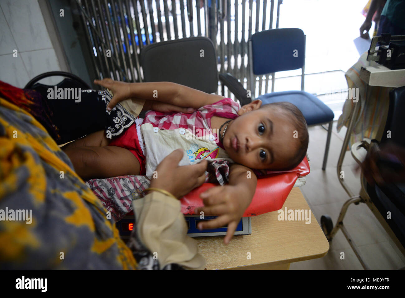 Bangladeshi children suffering from diarrhea with their mother at The International Centre for