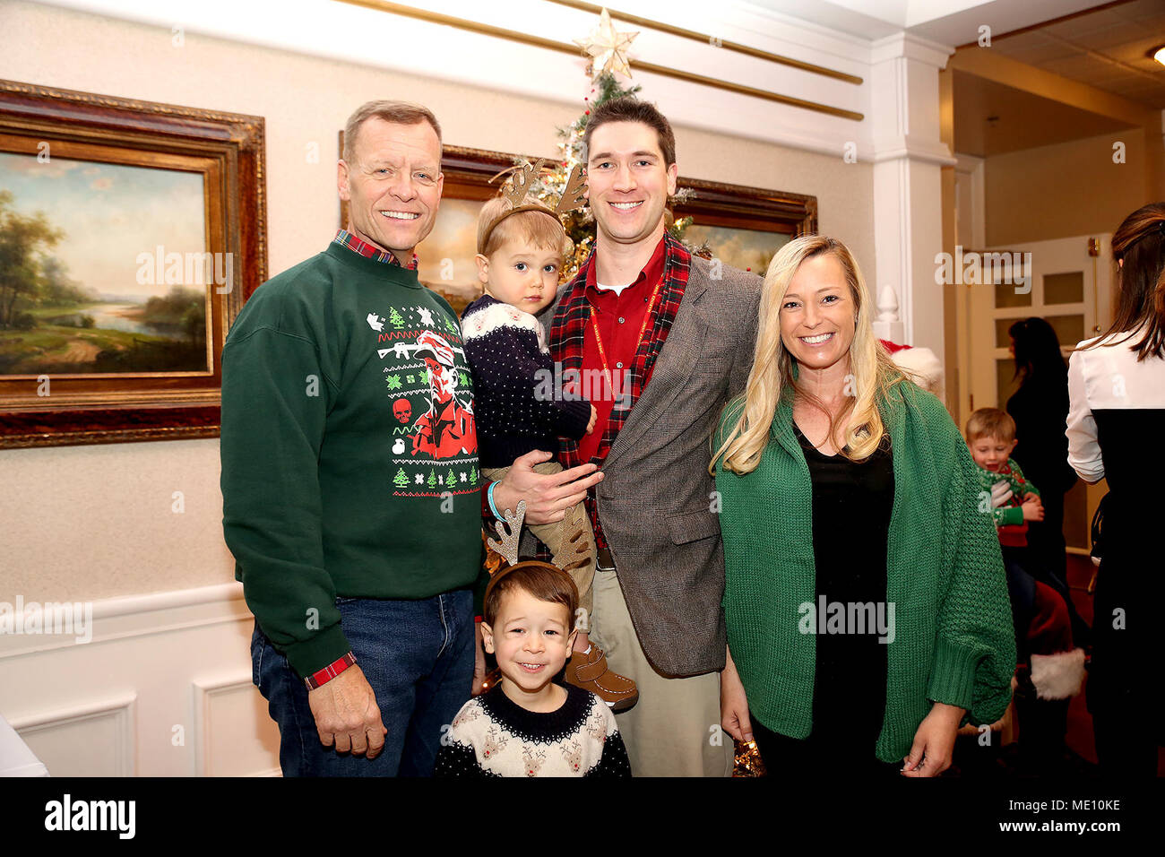 The Blumenthal family visits with Brig. Gen. Joseph Shrader (left