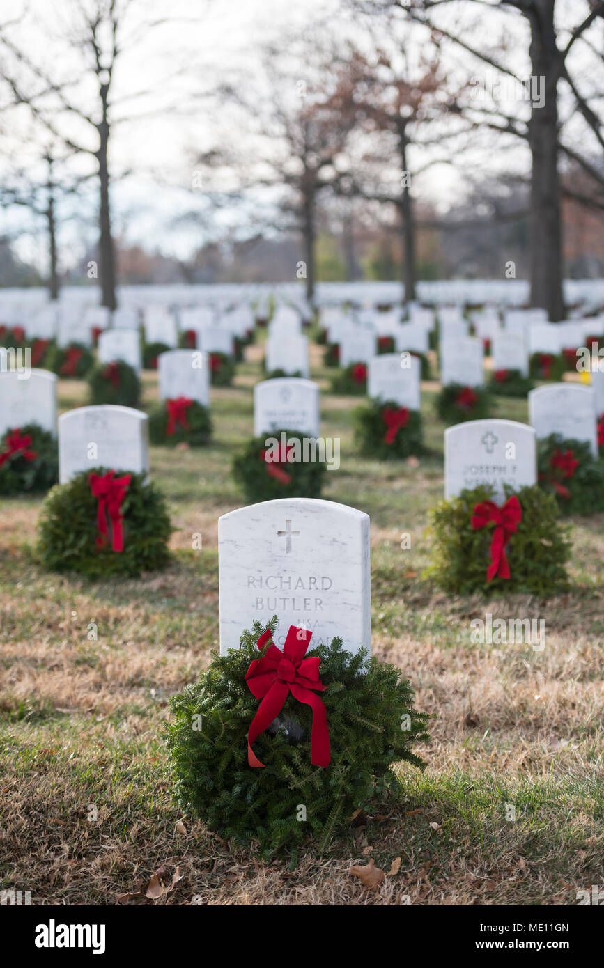 Wreaths rest on headstones in Section 65 of Arlington National Cemetery