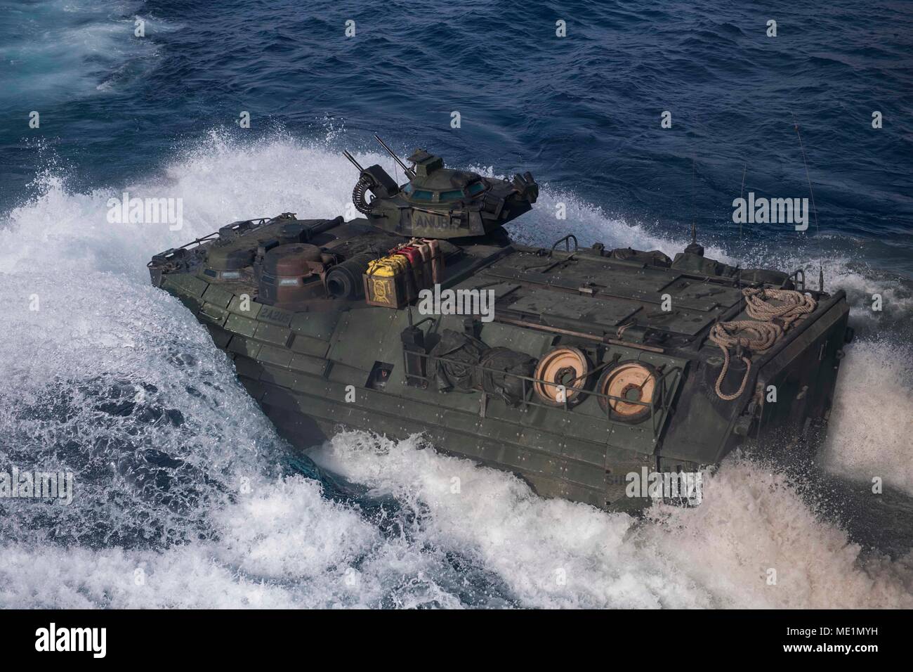 180418-N-TJ319-0049  U.S. 5TH FLEET AREA OF OPERATIONS (April 18, 2018) An AAV-P7/A1 assault amphibious vehicle assigned to the 26th Marine Expeditionary Unit departs the well deck of the Harpers Ferry-class dock landing ship USS Oak Hill (LSD 51) April 18, 2018. Oak Hill, home-ported in Virginia Beach, Virginia, is in the U.S. 5th Fleet area of operations participating in Eager Lion, a capstone training engagement that provides U.S. forces and the Jordan Armed Forces an opportunity to rehearse operations in a coalition environment and to pursue new ways to collectively address threats to regi Stock Photo