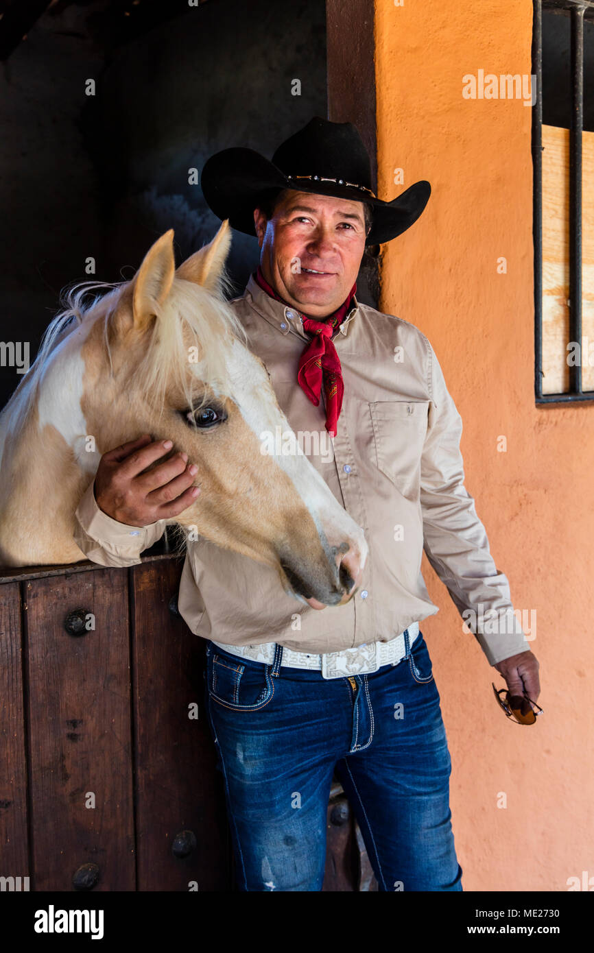 A ranch hand at RANCHO DEL SOL DORADO - SAN MIGUEL DE ALLENDE, MEXICO Stock Photo