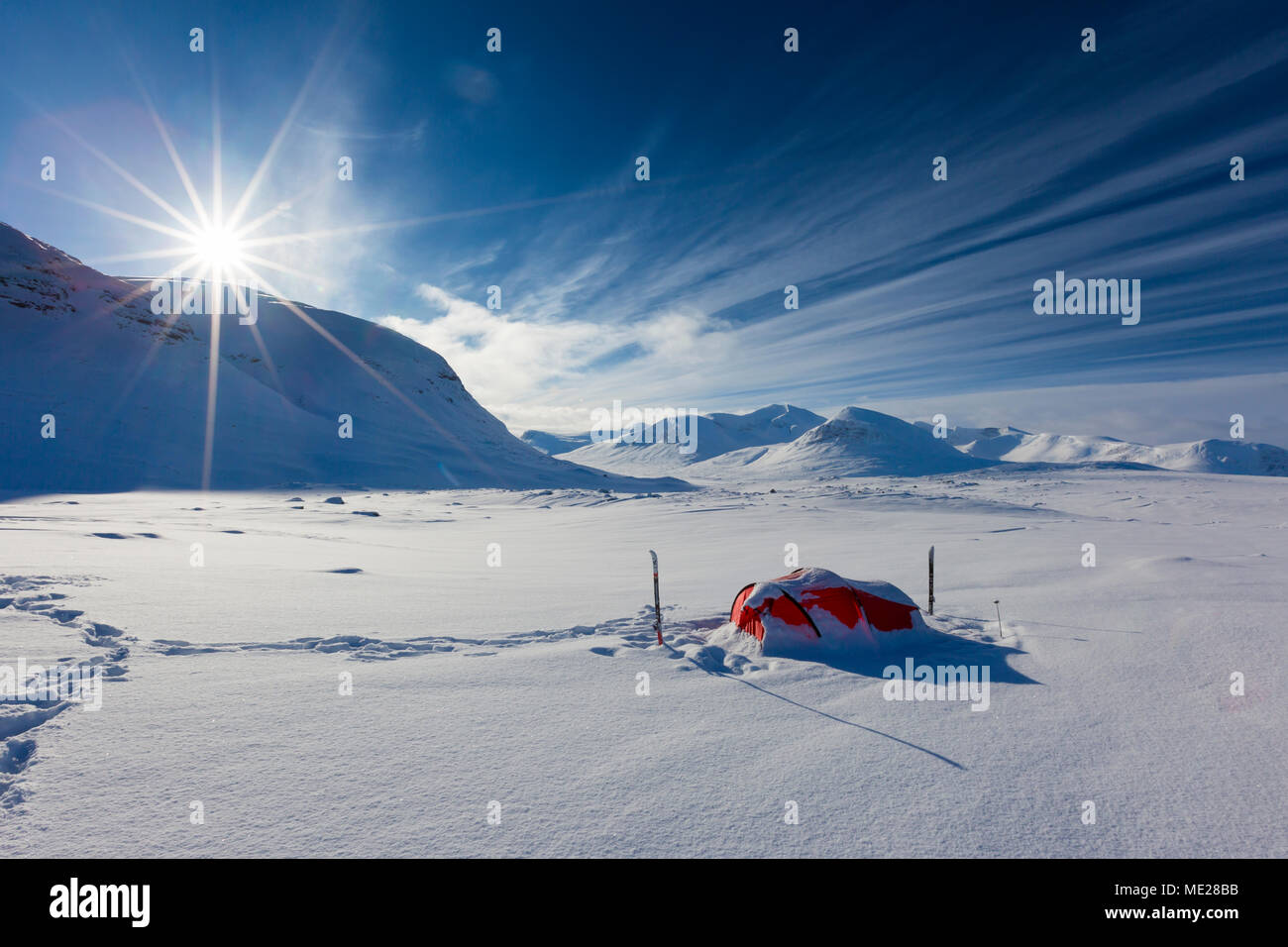 Tent with sun in the snow, Kungsleden or king's trail, Province of Lapland, Sweden, Scandinavia Stock Photo