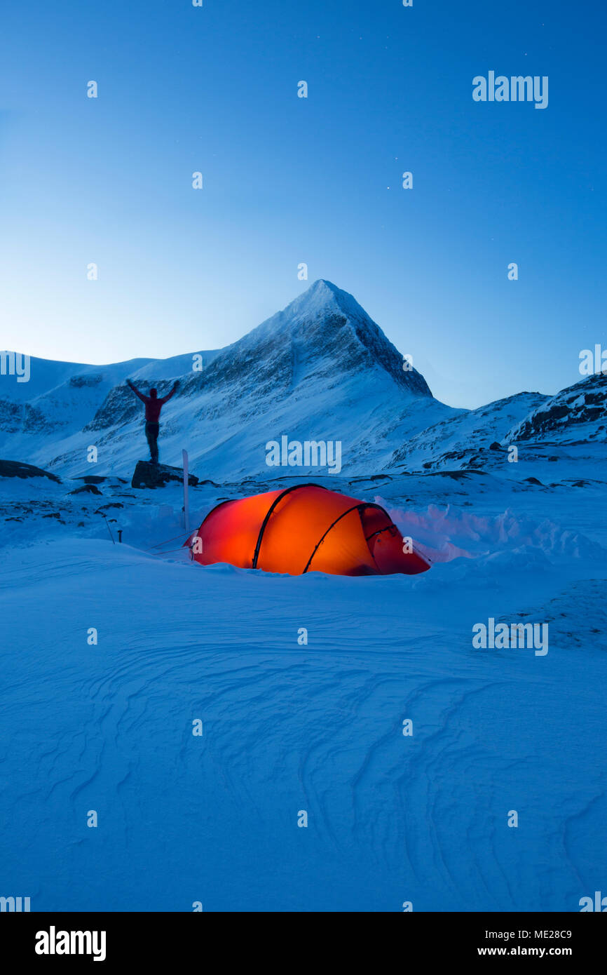 Tent with person in the snow, Kungsleden or king's trail, Province of Lapland, Sweden, Scandinavia Stock Photo