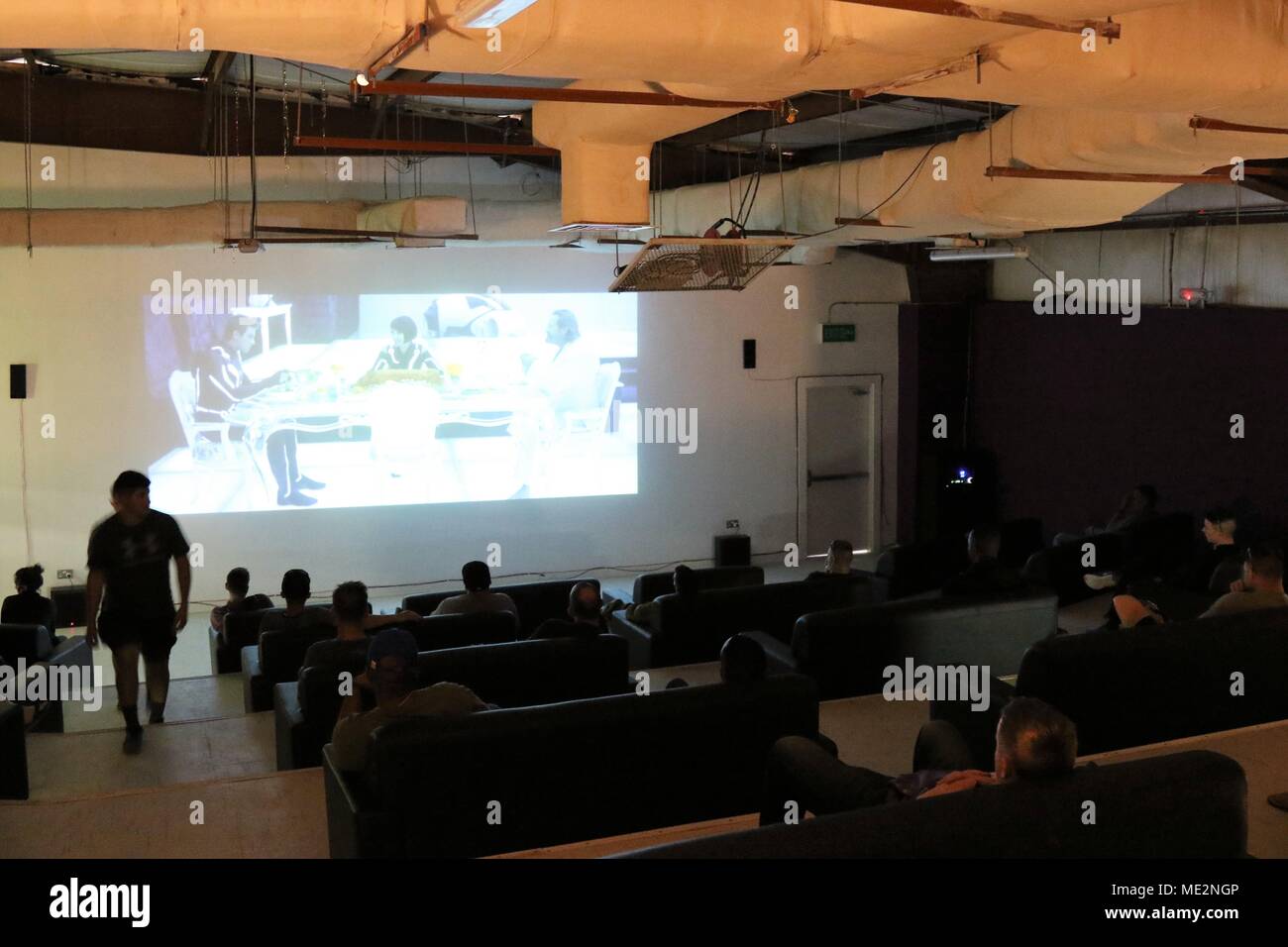 171205ARW053020 Service members enjoying the movie theater at the