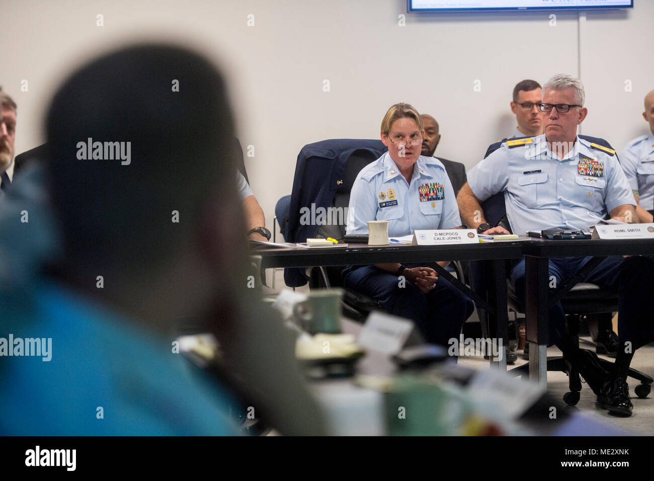 Master Chief Leilani L. Cale-Jones, Deputy Master Chief Petty Officer of the Coast Guard, and Rear Adm. Keith Smith, commander of Coast Guard Force Readiness Command, makes comments during a Board of Advisors Meeting, Thursday, Sept. 28, 2017. The board is holding its semi-annual meeting at the Coast Guard Training Center in Cape May, N.J., to discuss issues aimed at ensuring the best practices and policies are in place to ensure mission success. Official U.S. Coast Guard photos by Petty Officer 2nd Class Richard Brahm. Stock Photo