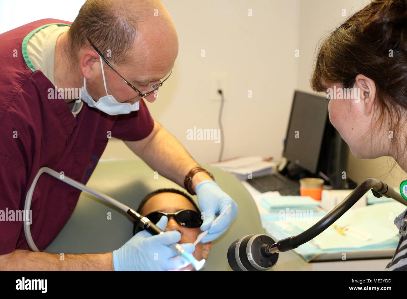 Lt. Col. Gregory Schmidt, a dentist assigned to the 122nd Fighter Wing