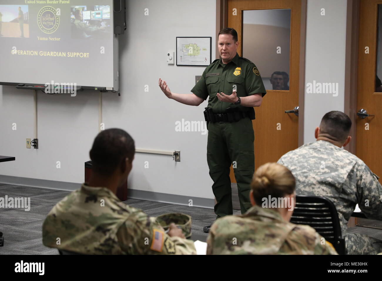 U.S. Border Patrol Deputy Chief Patrol Agent Carl Landrum welcomes National Guard Soldiers who arrived at U.S. Border Patrol Yuma Sector, April 18, 2018. Stock Photo