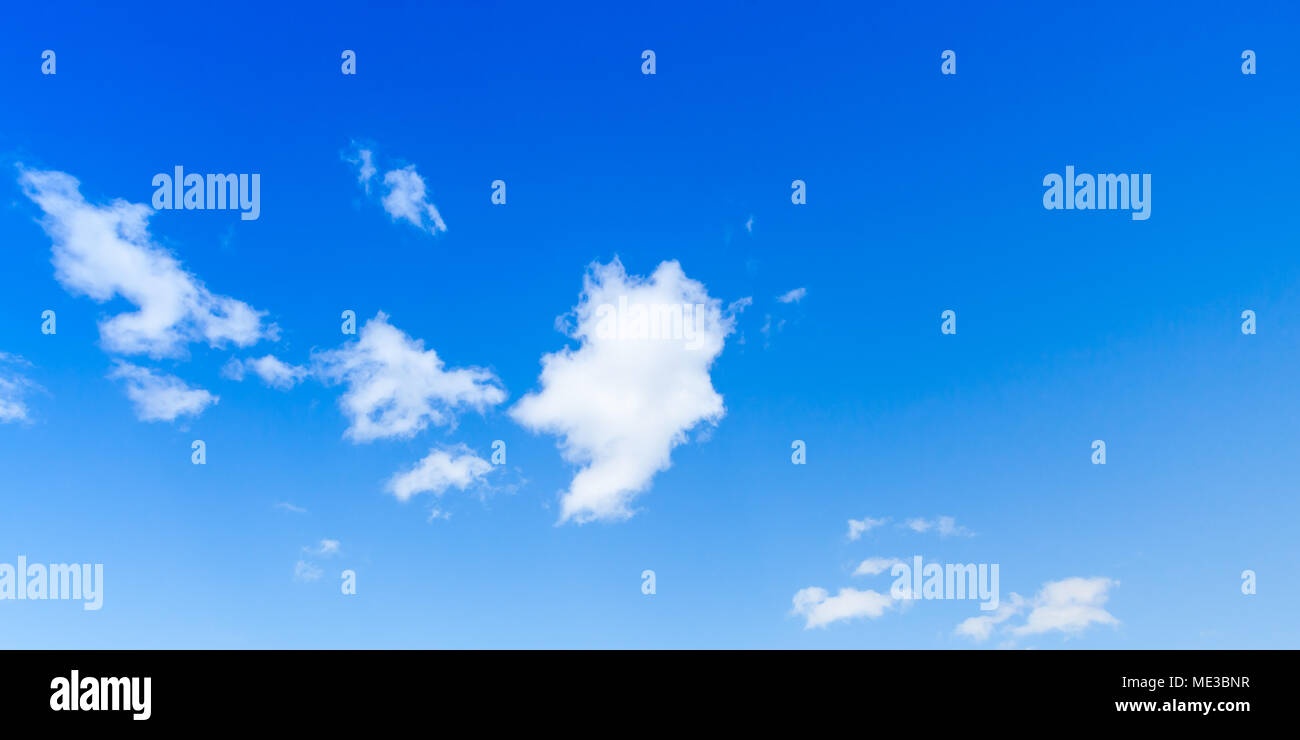 Blue sky with white clouds, natural background photo Stock Photo - Alamy