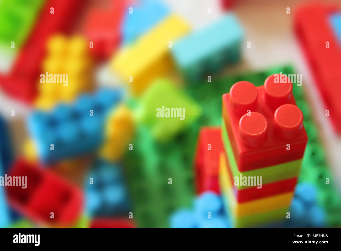 colorful stacked toy plastic blocks Stock Photo - Alamy