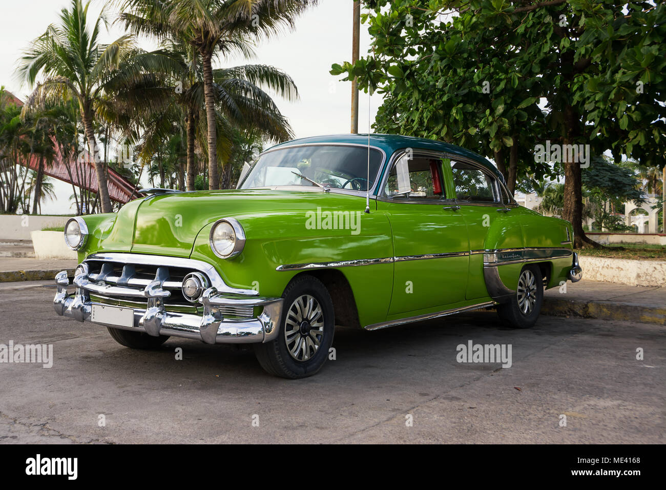 Cienfuegos, Cuba - December 7, 2017: Old green American car parked in Cienfuegos Stock Photo
