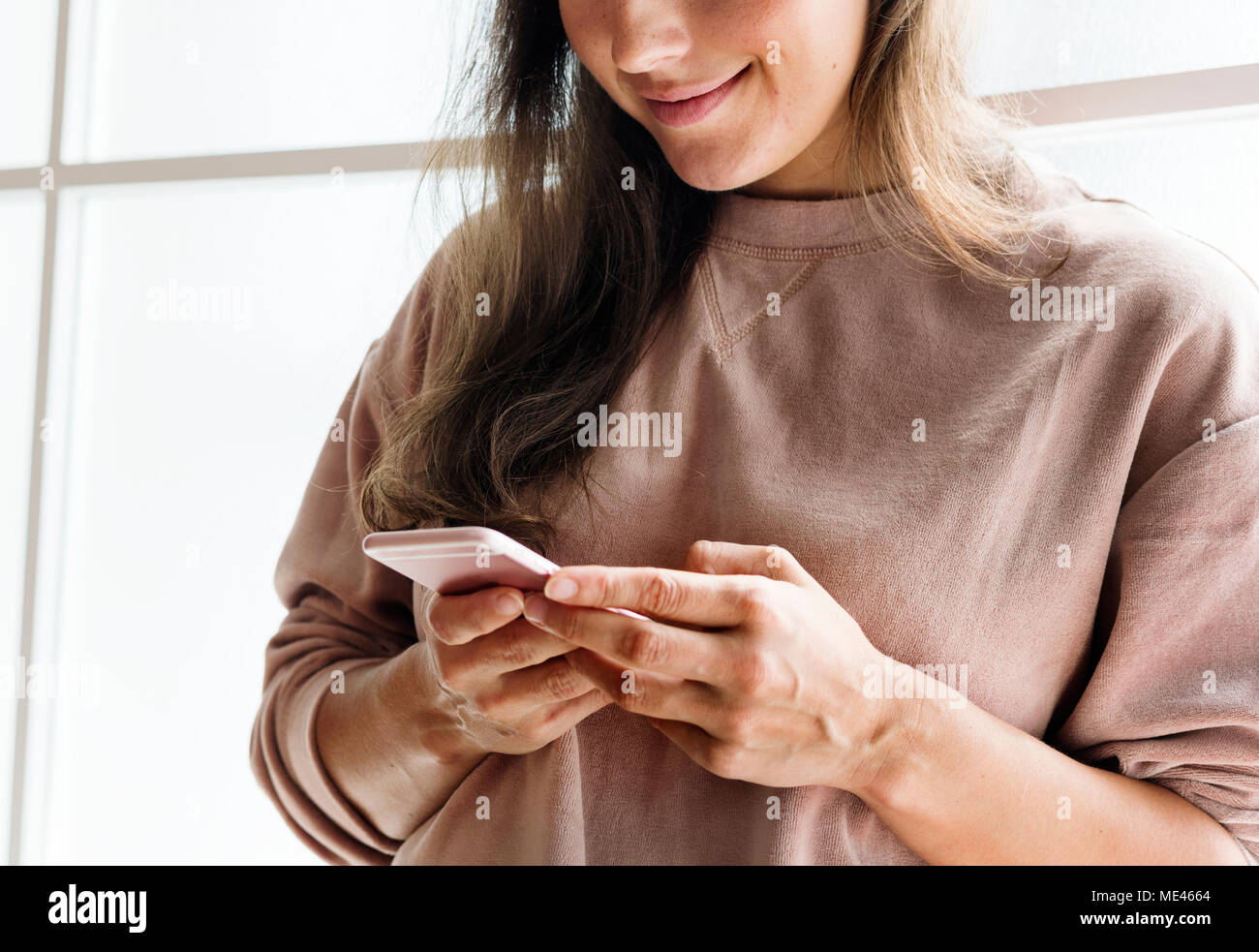 Woman using a smarphone social media conecpt Stock Photo