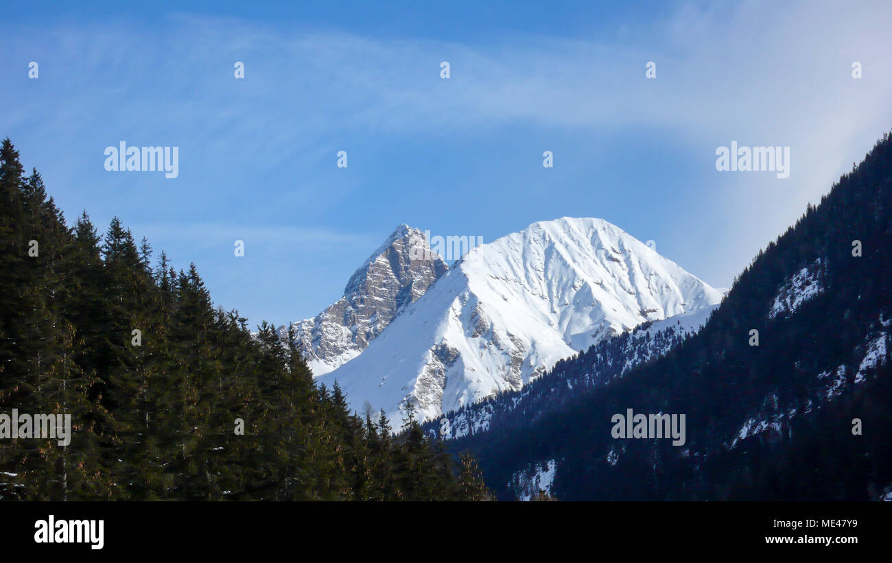 winter mountain landscape of the Parc Ela Park in southeastern Switzerland on a beautiful winter day Stock Photo