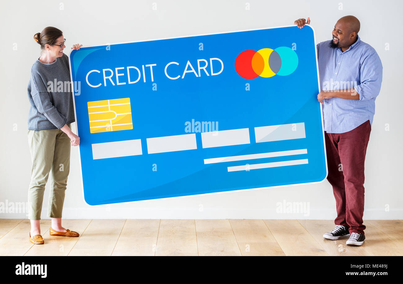 People holding a credit card Stock Photo