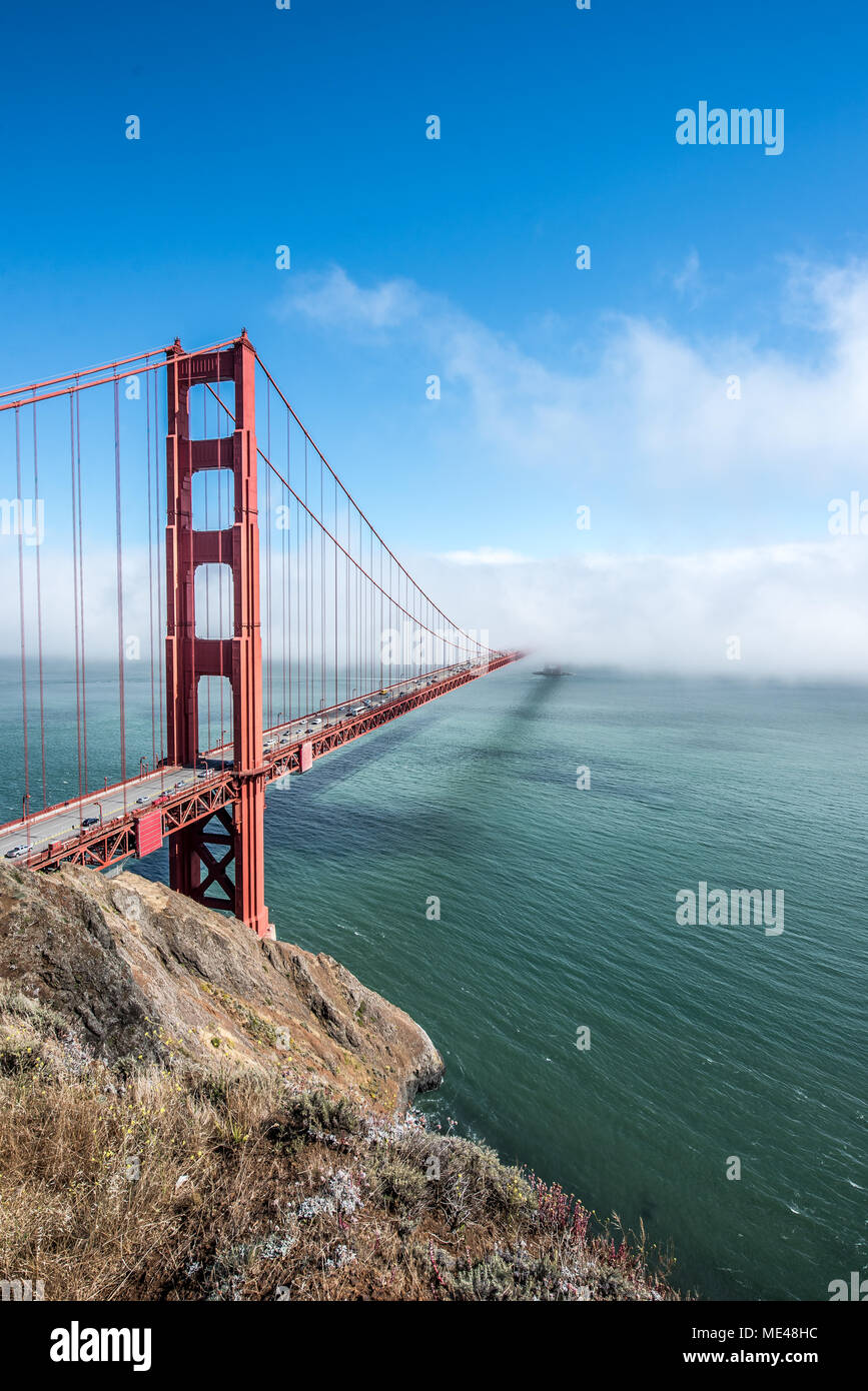 Golden Gate Bridge in clouds on a beautiful summer day - Panoramic view ...