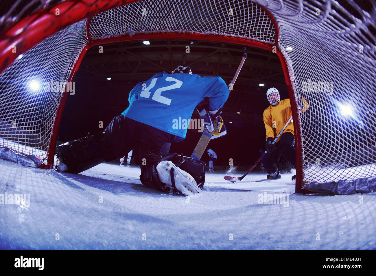 ice hockey goalkeeper player on goal in action Stock Photo Alamy
