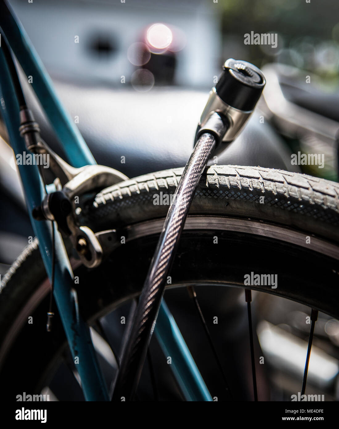 Metal lock on a bicycle wheel Stock Photo