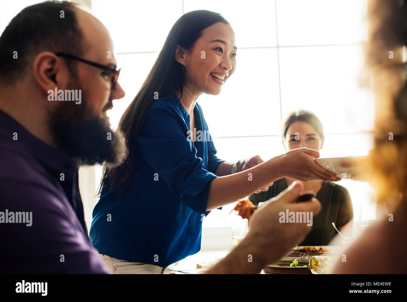 Friends celebrating holiday together Stock Photo