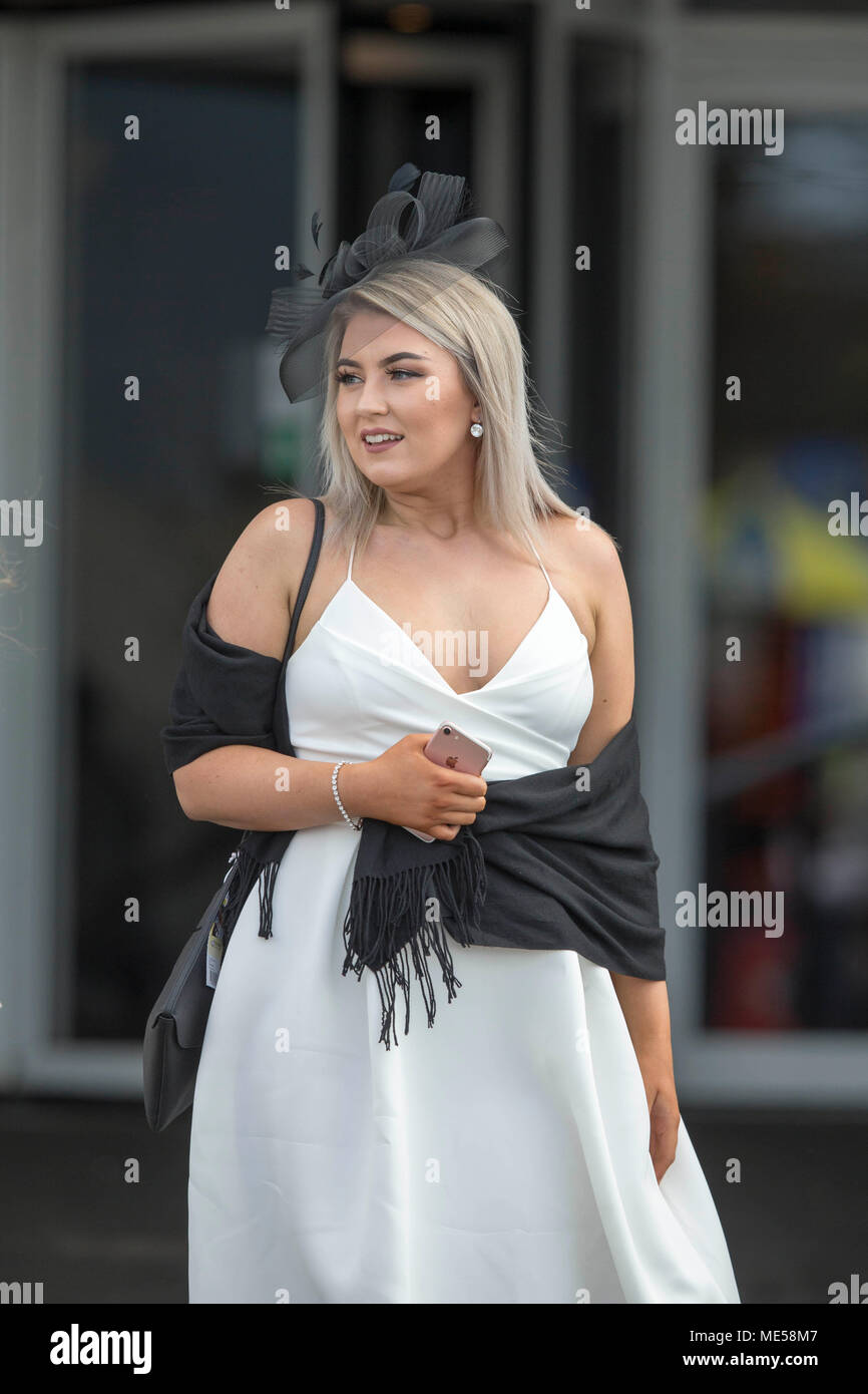 Racegoers arrive at the Coral Scottish Grand National 2018 meeting at Ayr Racecourse. Stock Photo