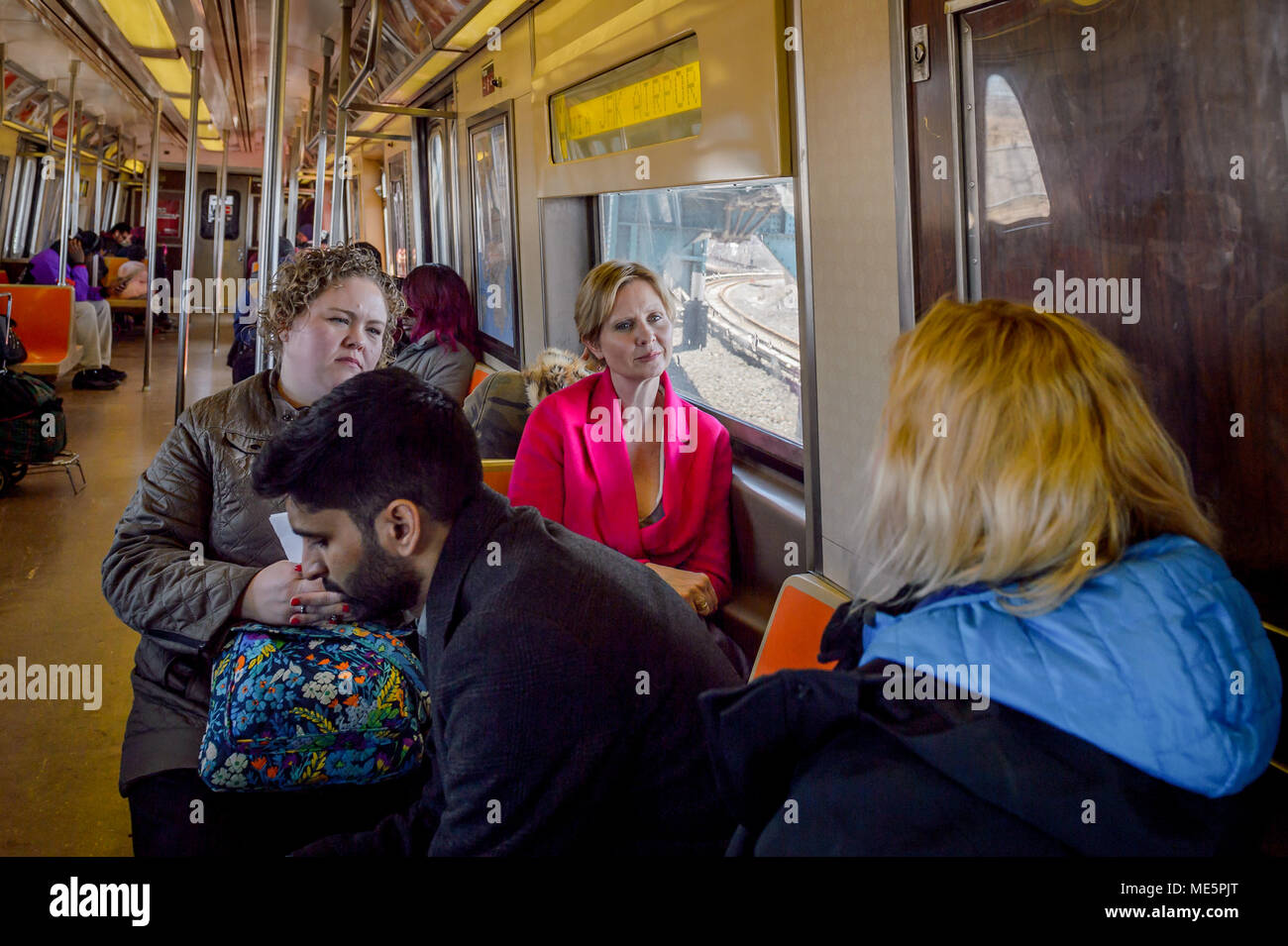 Averne, United States. 20th Apr, 2018. Cynthia Nixon taking the subway to  the Rockaways. Nixon, a lifelong New Yorker, actor, progressive advocate  and candidate running for governor presented her Climate Justice Agenda