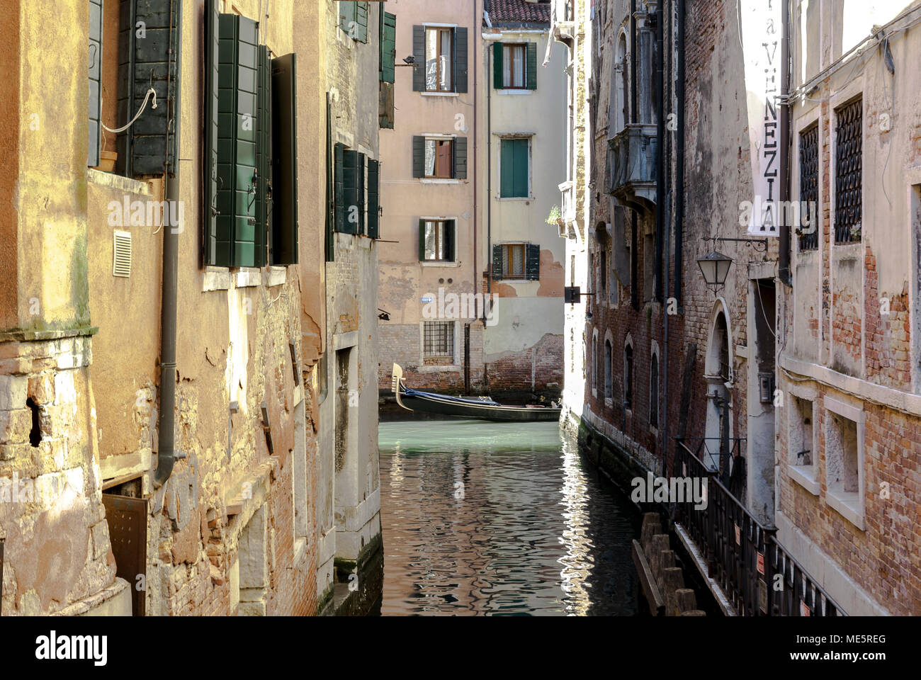 Venice canal with a gondola and typical buildings,Venice,2017. Stock Photo