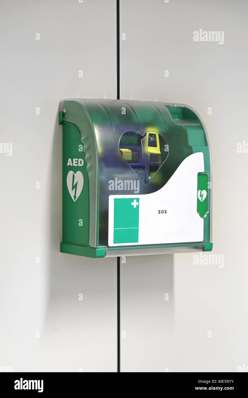 Automated External Defibrillator Emergency Device at Wall Stock Photo