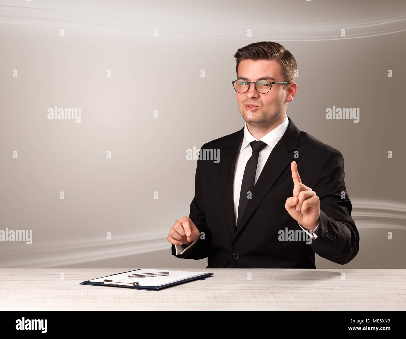 Televison presenter host in live show with blank background Stock Photo