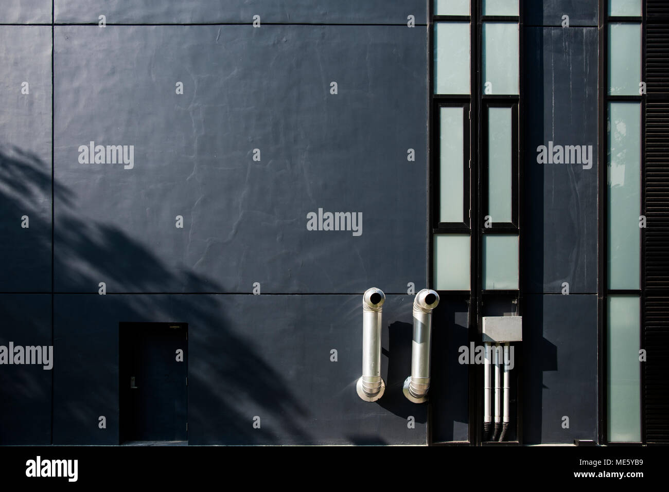 Dark navy blue building wall Stock Photo