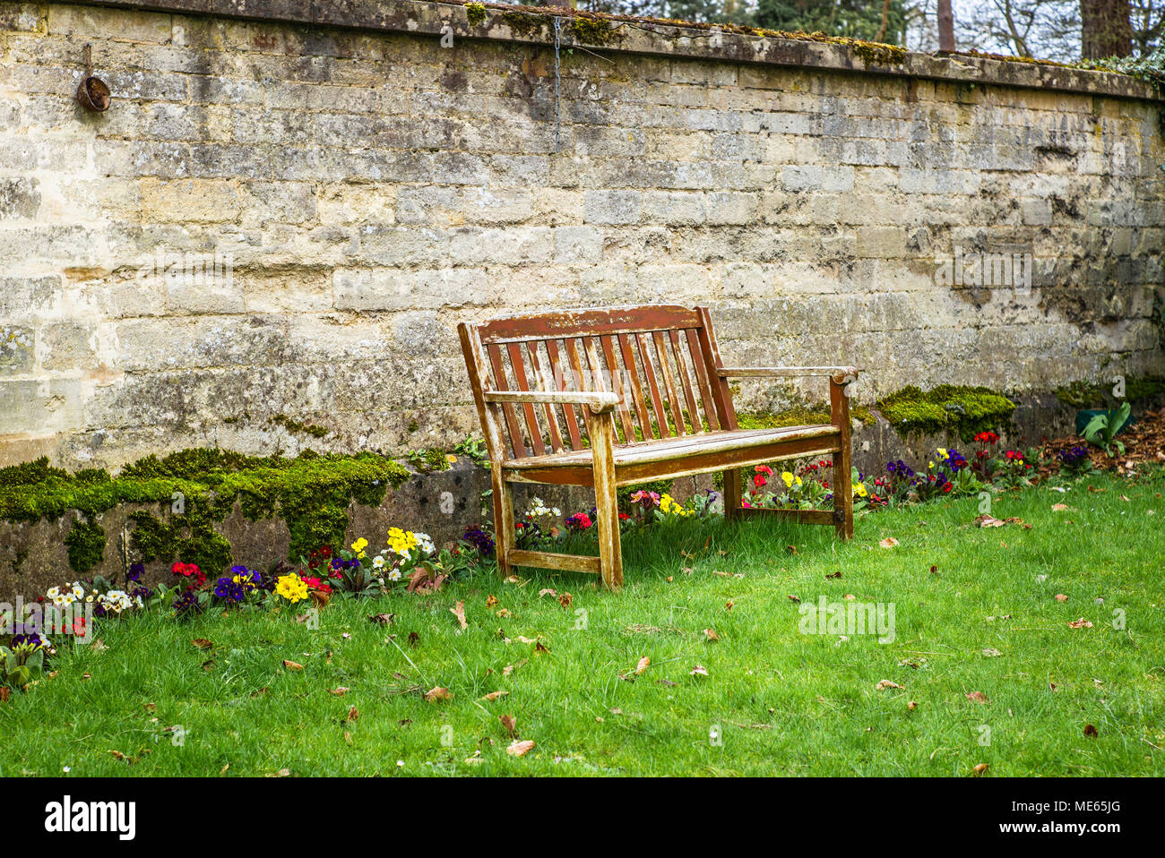 A Bench Surrounded By Flowers In Spring In Oxford Stock Photo