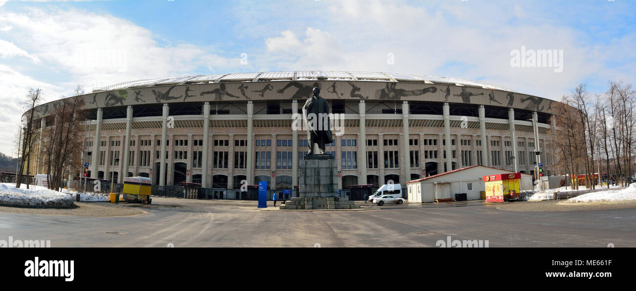 Moscow, Russia - March 22, 2018. Exterior view of Luzhniki stadium in Moscow, with Lenin monument, vehicles and people. Stock Photo