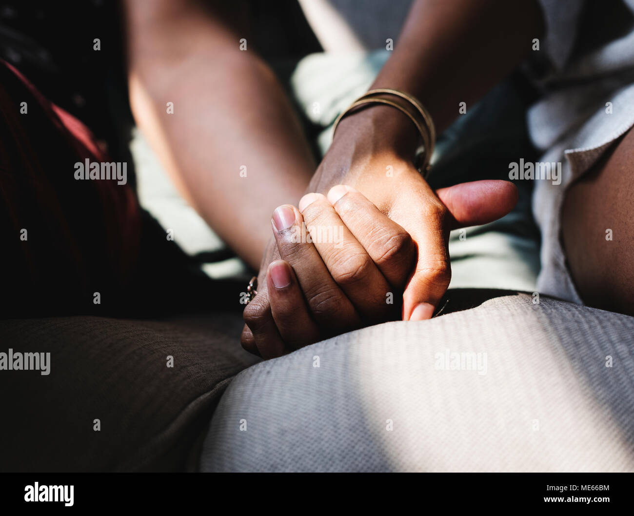 Closeup black family hands hi-res stock photography and images - Alamy