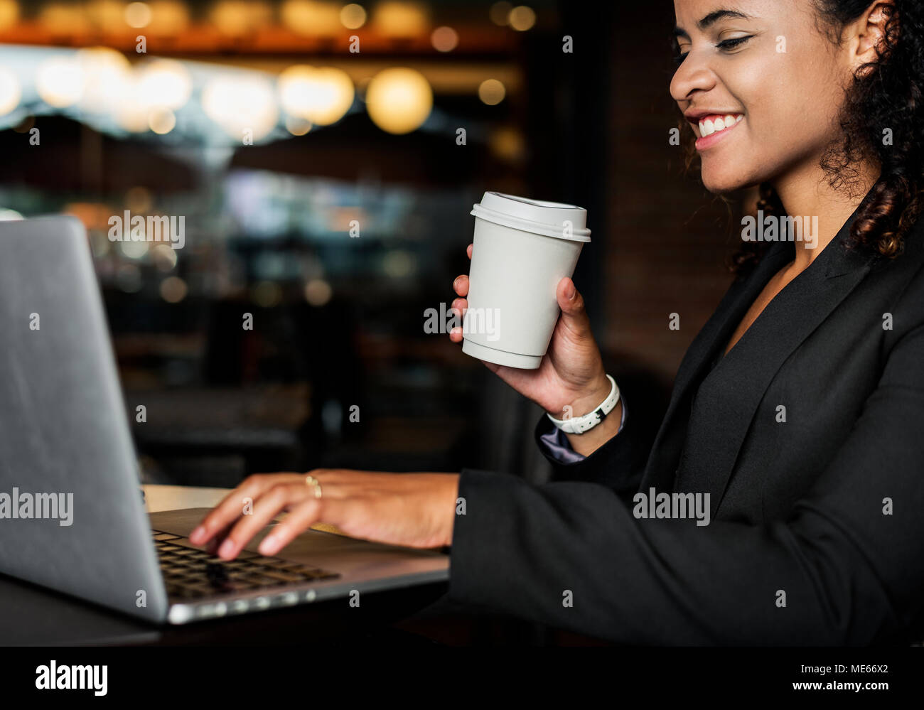 Woman working on a laptop Stock Photo