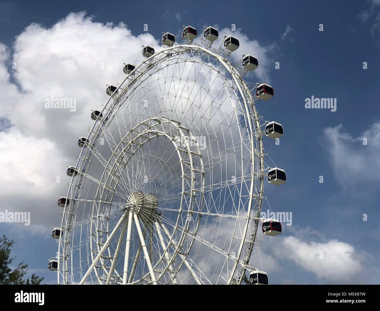 The Orlando Eye, a 400 ft tall giant Ferris wheel and the largest observation wheel on the East Coast of the United States. Located Orlando, Florida. Stock Photo